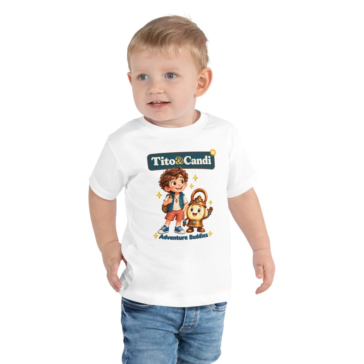 Toddler in a white T-shirt with Tito and Candi side by side and the words Adventure Buddies