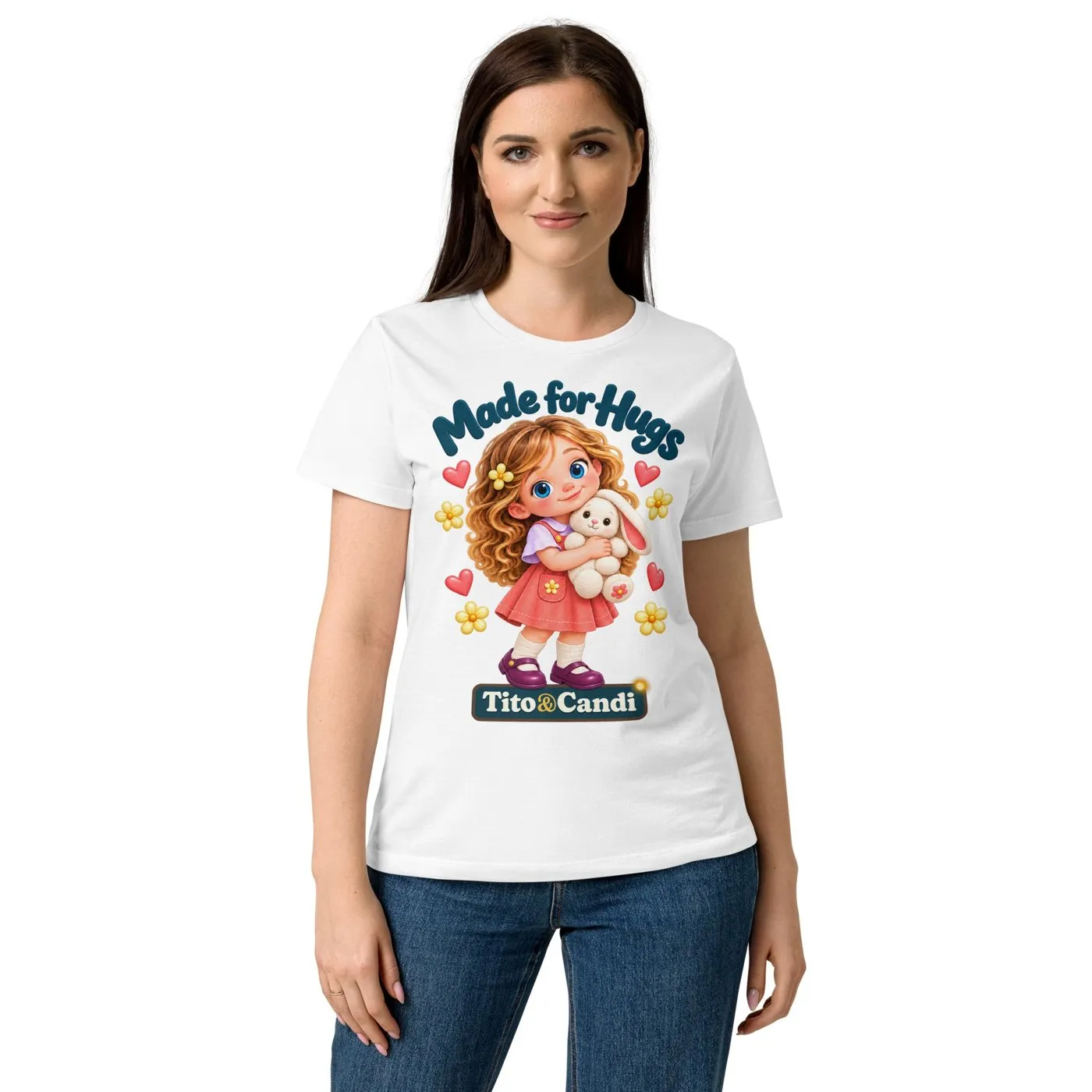 Woman in a white T-shirt with Alice hugging her plush bunny and the words Made for Hugs